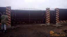 Кованные откатные ворота с калиткой, установлены в Солнечн...
